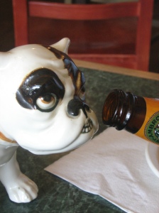 Dog having a sip of Greg Lau's Apricot Beer.